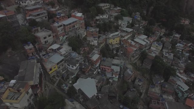 Favela Aerials: Backwards tilt over favela houses in Rio de Janeiro, Brazil
