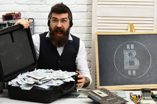 Being open to bitcoin. Bearded hipster with bitcoin symbol and dollars. From paper money to crypto currency. Bitcoin for business. Bearded man with cash money. Business man in server room