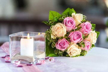 Pink and yellow roses in bouquet