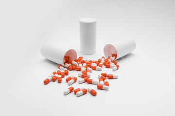 Orange Pills on a white background, medical pills