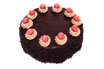Delicious chocolate cake isolated on white background .