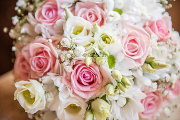 Obraz na płótnie Canvas beautiful wedding bouquet pastel pink rose and white foliage 