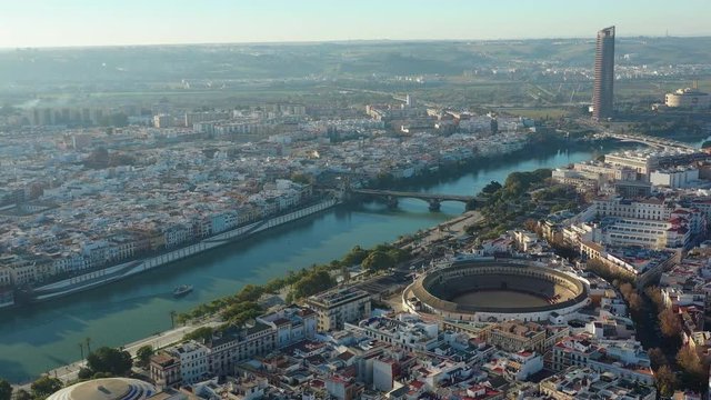 Aerial view of Seville, famous European historic city and capital of Andalusia, (corrida bullring) bullfighting arena (Plaza de toros de la Real Maestranza de Caballeria de Sevilla) - Spain, Europe
