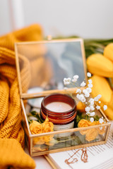 candles and flowers in box
