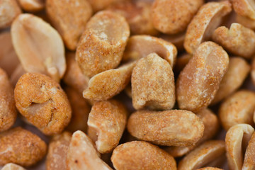 Spicy peanuts on a wooden platter