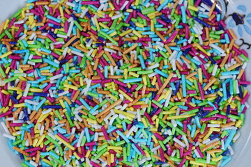 Fototapeta na wymiar colorful confectionary sprinkles, colorful sugar beads