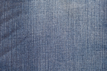 blue denim jeans with wrinkle texture background .