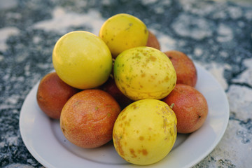 Platter of colorful ripe tropical passion fruit