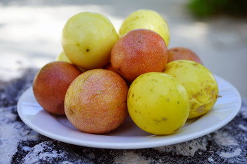 Platter of colorful ripe tropical passion fruit