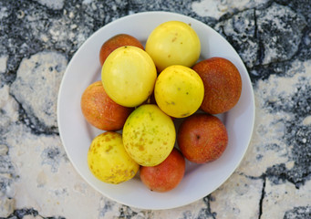 Platter of colorful ripe tropical passion fruit