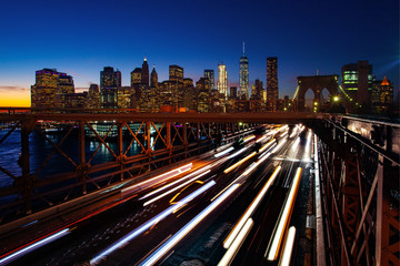 Fototapeta na wymiar Busy traffic in New York City, Manhattan, Brooklyn Bridge