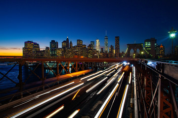 Fototapeta na wymiar Busy traffic in New York City, Manhattan, Brooklyn Bridge