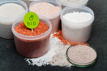 Chemical fertilizer on soil background
