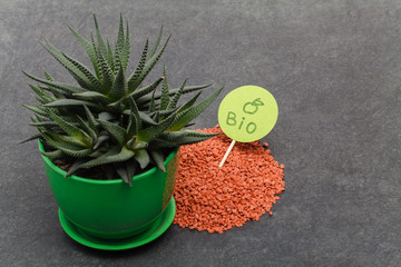 Garden background with mineral fertilizers balls. Complex mineral fertilizer with sodium,...