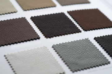 Catalog of multicolored imitation leather from matting fabric texture background, leatherette...