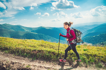 Young woman hiking in the mountains