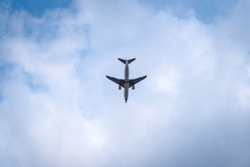Airplane flying in the blue sky