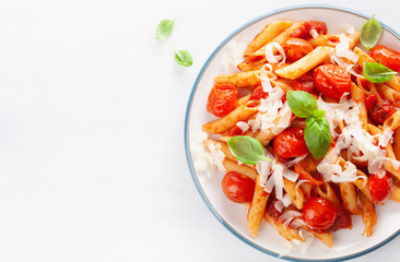 italian penne pasta with tomatoes parmesan basil