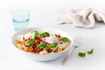 spaghetti bolognese with basil and parmesan, italian pasta