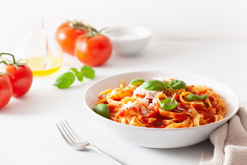 tagliatelle pasta with tomato sauce parmesan basil