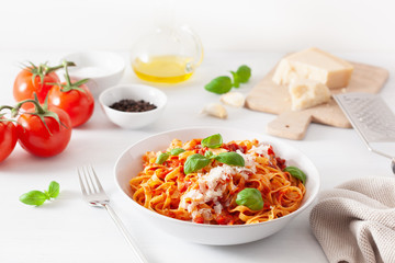 tagliatelle pasta with tomato sauce parmesan basil