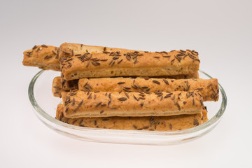 crackers ,Cheese Sticks With Caraway Seed on white 