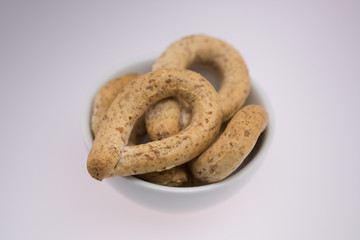Pretzels crackers,bagels  with with olives and wine 