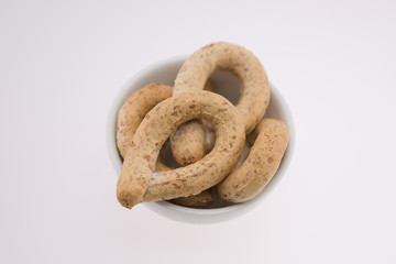 Pretzels crackers,bagels  with with olives and wine 