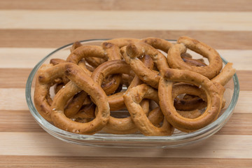 Pretzels crackers  with with olives and wine 