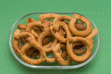 Pretzels crackers  with with olives and wine 