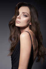 Naklejka premium Fashion photo of beautiful lady in black dress.