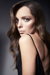 Fototapeta premium Fashion photo of beautiful lady in black dress.