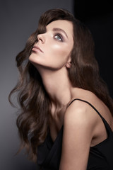 Fototapeta premium Fashion photo of beautiful lady in black dress.