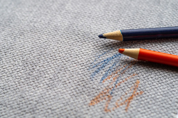 Drawn fabric on the couch with colored pencils. Furniture fabric. Cleaning concept