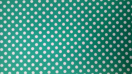 Fondo color verde con puntos blancos