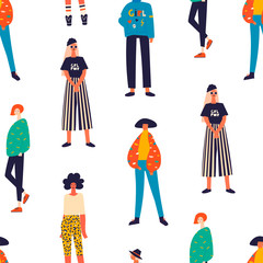Young women dressed in trendy clothes standing in various poses. Girl power concept. Female cartoon characters. Hand drawn colored vector seamless pattern