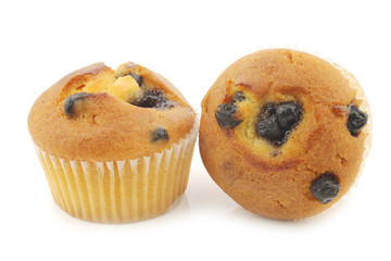 freshly baked blueberry muffins on a white background
