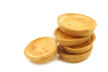 stacked  filled marmalade cakes on a white background