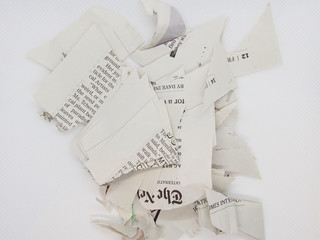 torn and crumpled newspaper