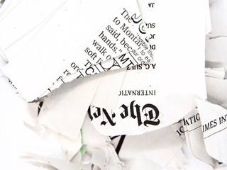 torn and crumpled newspaper
