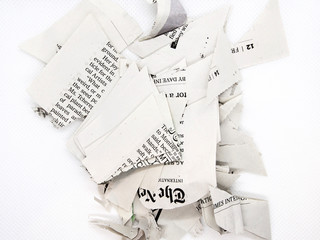 torn and crumpled newspaper