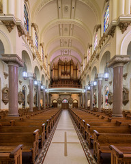 Fototapeta na wymiar Pipe organ in the rear of the Sacred Heart Catholic Church in downtown Tampa, Florida