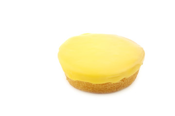 Traditional Dutch yellow glazed cakes on a white background