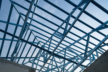 Naklejka na ściany i meble Structure of steel roof frame for building construction.