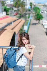 A woman is looking at a map for traveling,traveling in Thailand,traveling in Chiang mai 