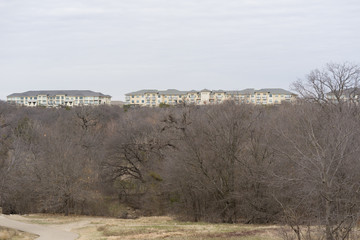 City park with apartment complex in the background