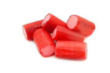 Red candy candy with pink filling on a white background