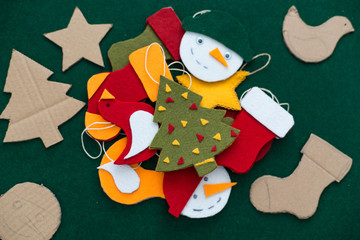 Making of handmade christmas toys from felt