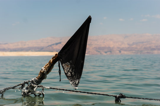 Salty Old Black Flag in the dead sea in israel