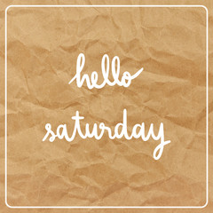 Hello Saturday on brown crumpled paper background